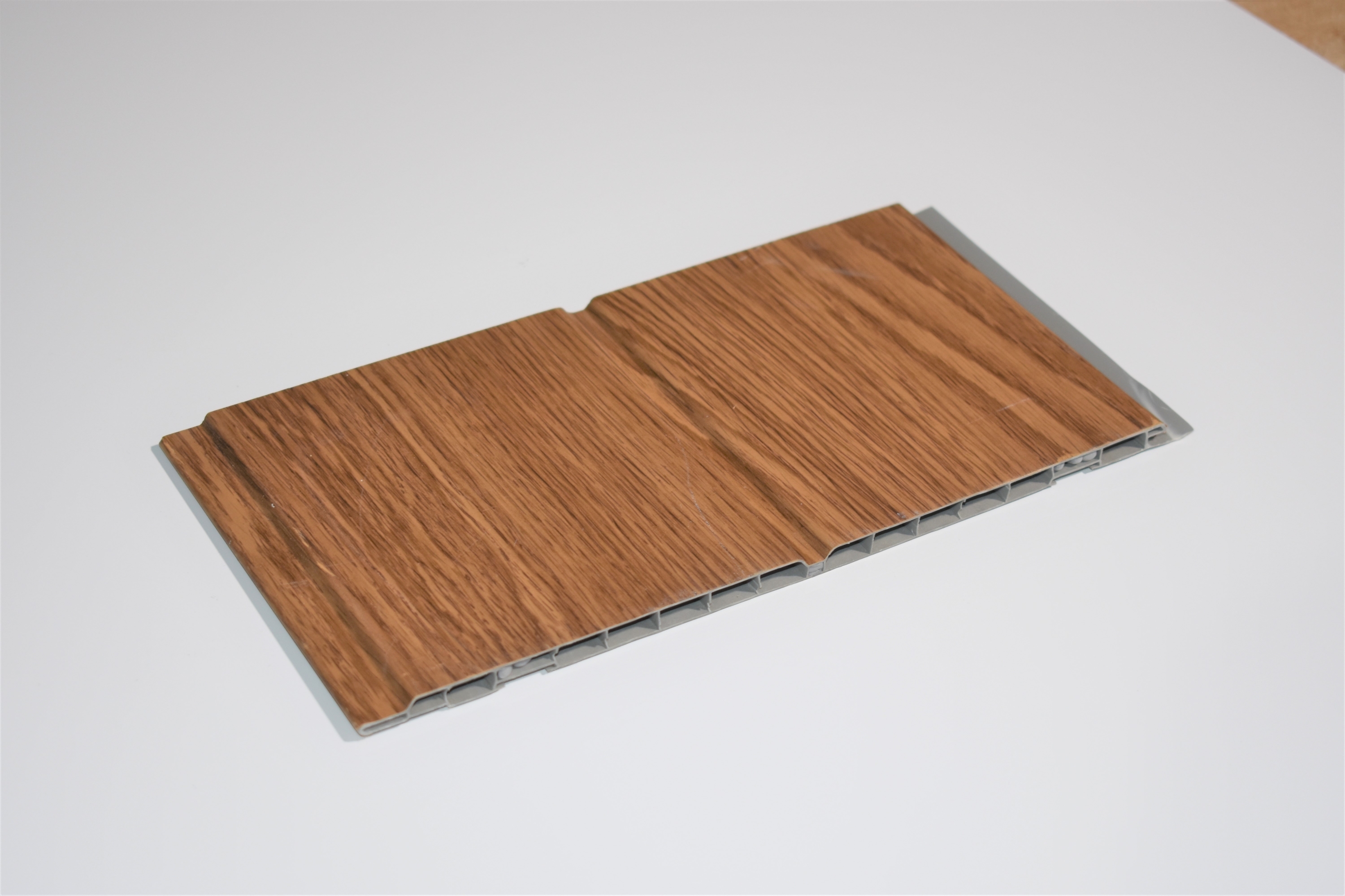 Imagen de 1 Panel de revesimiento de pvc, color imitación madera Nogal claro 0.25 x 2.6 mts